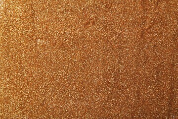 Beautiful shiny bronze glitter as background, closeup