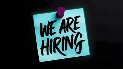 Blue sticky note that says WE ARE HIRING
