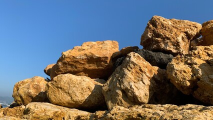 Beautiful landscape of beach with stone on the foreground