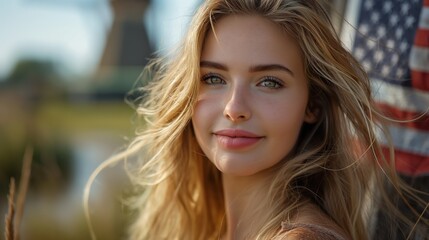 Patriotic American Flag Flapping on a Picturesque Windmill in Rural Landscape
