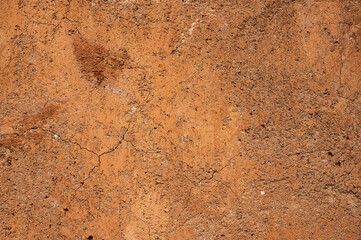 Full frame shot of an earthen wall texture of clay house structure.