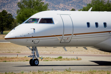 Obraz premium Nose of a Private Jet on the runway