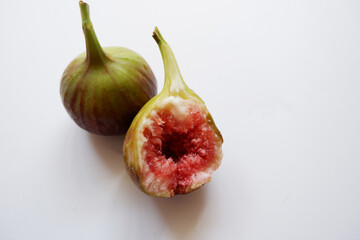 Ripe fig fruits composition on white background. Fresh fig fruits. 