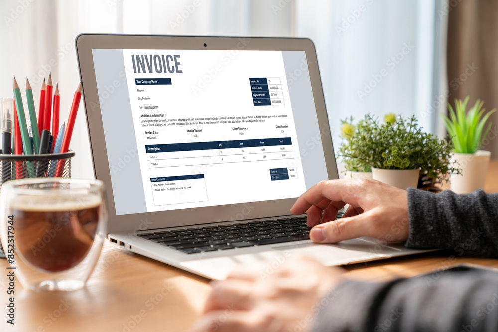 Poster invoice on computer screen from accounting application. computer program for financial and budget of