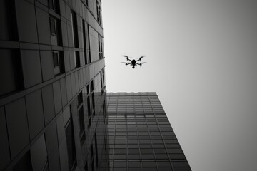 A Drone Flying in Front of a Building

