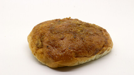 Delicious bread with shredded topping isolated