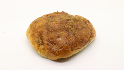 Delicious bread with shredded topping isolated