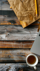 Laptop and coffee on a wooden table. Top view. Place for text