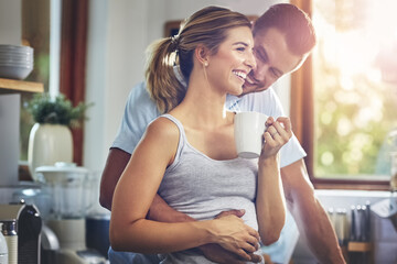 Coffee, hug and smile with couple in kitchen of home together for morning break or wellness. Cup, love or tea with happy man and woman drinking fresh beverage in apartment to relax for romance