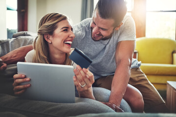 Laughing, tablet or happy couple with credit card in home for ecommerce sale, fintech web or order...