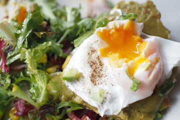 Tasty fresh toast with avocado and egg