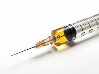 A syringe with a yellow liquid in it