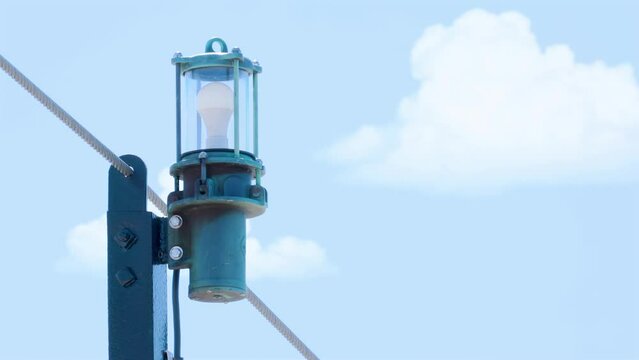 Lighthouse emergency lights mounted with cables on scaffolding