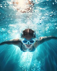 Naklejka premium Underwater shot of a swimmer in action, wearing goggles and a swimsuit, captured in a pool with sparkling water. Perfect for sports and lifestyle themes.