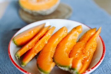 ripe melon cut on a plate