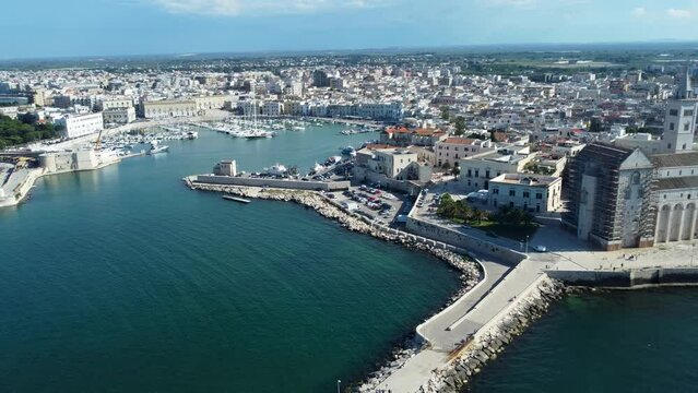 4K drone footage of the harbour and Cathedral at Trani, located in the Apulia region of southern Italy