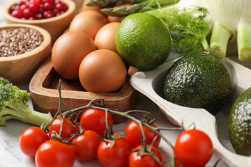 Many different healthy food on light table, closeup