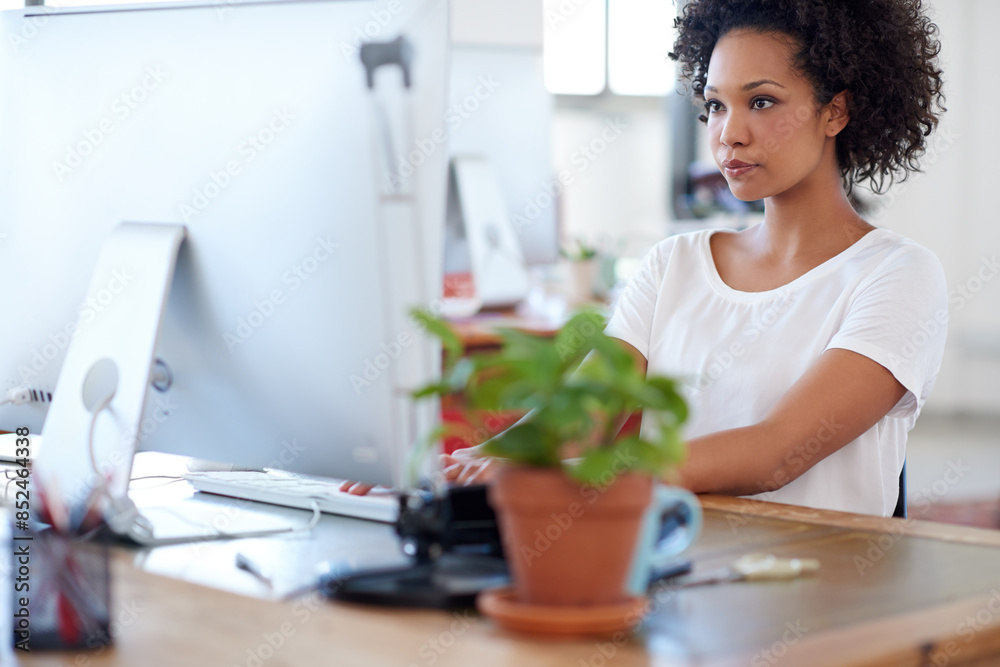 Poster Solution, web designer or African woman on computer for digital project development or problem solving. Serious, network or female person reading on technology in creative agency or startup business