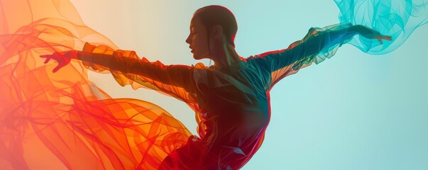 Silhouette of a woman dancing with flowing fabric in vibrant orange and blue hues.