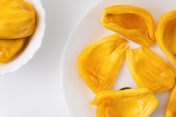 Jackfruit in a plate on a white backdrop