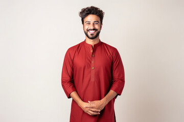 Obraz premium young indian man in traditional wear on white background