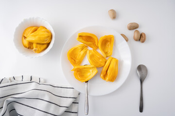 Jackfruit in a plate on a white backdrop