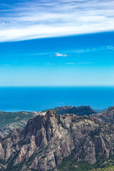 Fototapeta premium Hiking in Corsica mountains, beautiful clouds, sky and landscape