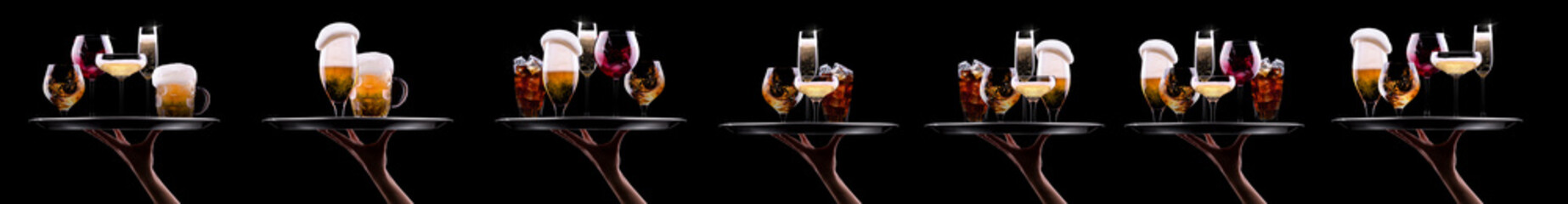 Hand holding tray with different alcohol cocktails isolated on black background