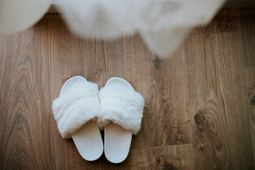 Bridal shoes seen through the wedding dress