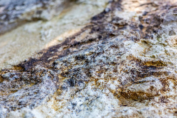 An abstract natural stone background. A banner made of stone. A place to demonstrate the product.