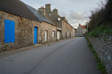 Quaint Breton Houses with Blue Shutters in Normandy Village. France.