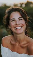 Fototapeta premium Radiant Woman Smiling Outdoors in Natural Light Post-Microdermabrasion on a Sunny Day