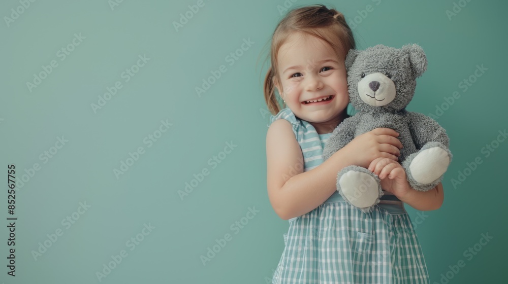 Poster A girl with teddy bear