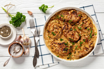 creamy smothered pork chops cooked in onion gravy