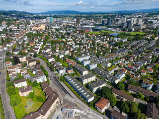 Aerial view of Swiss City of Zürich north part with cityscape and horizon on a sunny spring morning. Photo taken June 16th, 2024, Zurich, Switzerland.