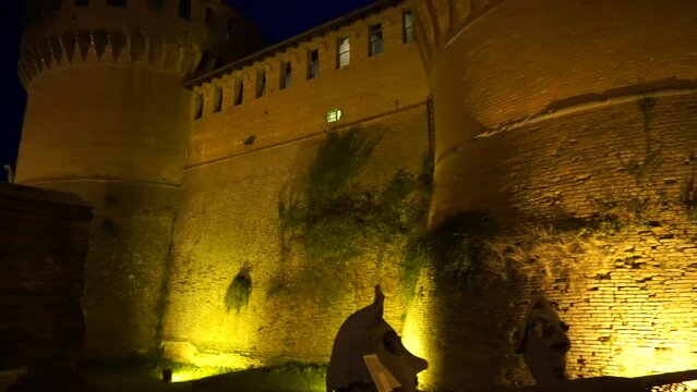 The nocturnal atmosphere around Dozza Castle creates a captivating setting, inviting contemplation of its historical significance under the serene embrace of the night in Dozza village in Italy.