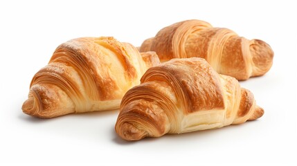 Three freshly baked croissants isolated on a white background, perfect for bakery, breakfast, and pastry design concepts.