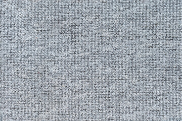 The clear texture of the short-pile gray carpet