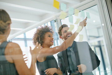 Glass wall, ideas and business people with brainstorming, teamwork and feedback in meeting. Group,...