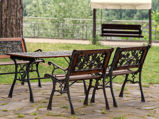 Detail of the rest benches in the spa forest park for visitors