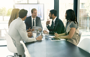 Meeting, finance and business people in office with collaboration for corporate investment strategy. Discussion, team and financial advisors with company stocks, trading or profit growth in workplace