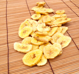 Banana chips on bamboo mat
