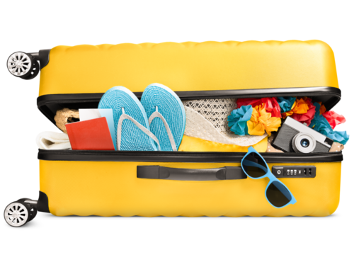 a full ajar suitcase with summer accessories, a passport and a camera lies on its side, on a white isolated background