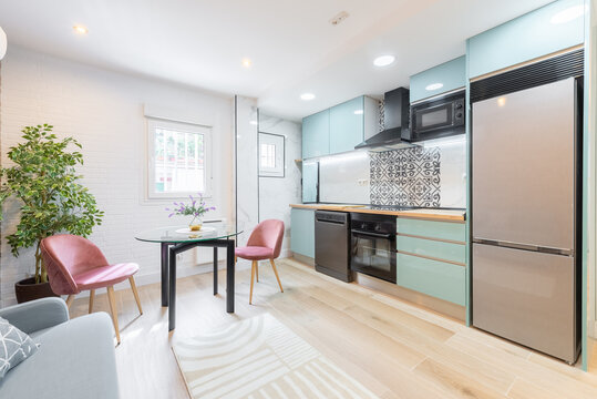 Modern and stylish kitchen with elegant dining space
