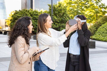 Diverse women team testing virtual reality in a city setting