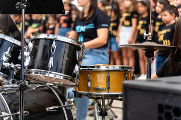 Female musician percussionist playing drums