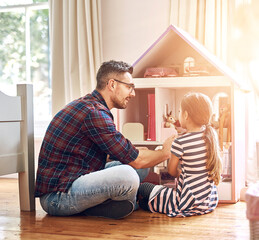 Father, child and doll house in bedroom for play, fantasy or fun together at home. Dad, kid and...