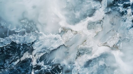 Fototapeta premium Abstract marbled pattern with shades of blue and white, resembling liquid waves or frozen water
