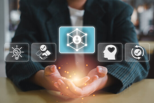 A business professional showcasing essential soft skills such as communication, teamwork, and emotional intelligence with futuristic digital icons.