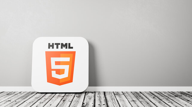 HTML 5 App Icon on Wooden Floor Against Wall